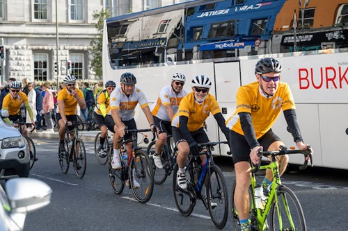 The team cycle into the finish line at Galway's Eyre square, ready to celebrate their efforts!