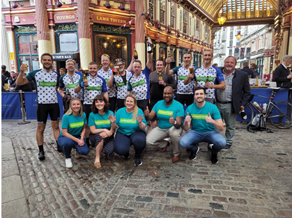 Ride 4 Life team celebrating the end of their 200-mile cycle ride
