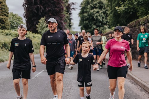 Rory Best, Rugby legend, walks with his wife Jodie and their children followed by their army of supporters on their Miles2Mayo challenge.