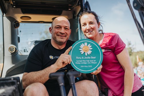 Rory with his wife Jodie, just after making the first dig at the site of Daisy Lodge, County Mayo – the finish line of their 10 day walk.